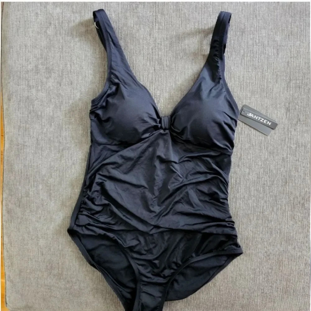 Jantzen size 14 women's black one piece swimsuit with center know detail